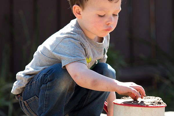 boy-playing-sand